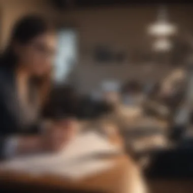 Person working at a desk with financial records