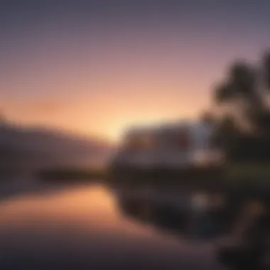 Luxurious RV parked beside tranquil lake at sunset